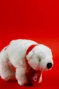 Atlanta, Georgia, USA April 1, 2020: souvenir polar bear Coca-Cola closeup isolated on red background